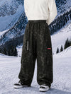Pantalon de snowboard cargo ample et extensible pour homme, style freestyle, en tissu Techline utilitaire et résistant.