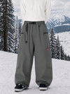 Pantalon de snowboard cargo ample et extensible pour homme, style freestyle, en tissu Techline utilitaire et résistant.