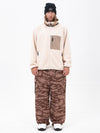 Pantalon de ski ample et décontracté pour homme, en polaire sherpa synthétique zippée et genoux renforcés.