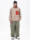 Pantalon de ski ample et décontracté pour homme, en polaire sherpa synthétique zippée et genoux renforcés.