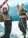 Pantalon cargo en denim Mountain Freerider pour femme, style ample, idéal pour le snowboard.