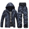 Ensemble veste et pantalon de ski pour homme, idéal pour les aventures hivernales en plein air.
