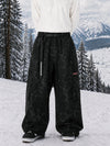 Pantalon de snowboard cargo ample et extensible pour homme, style freestyle, en tissu Techline utilitaire et résistant.