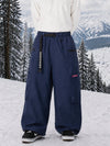 Pantalon de snowboard cargo ample et extensible pour homme, style freestyle, en tissu Techline utilitaire et résistant.