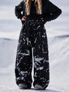 Pantalon de snowboard cargo ample et extensible pour femme, style freestyle, en tissu Techline utilitaire et résistant.