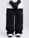 Pantalon cargo en denim Mountain Freerider pour femme, style ample, idéal pour le snowboard.