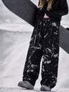 Pantalon de snowboard cargo ample et extensible pour femme, style freestyle, en tissu Techline utilitaire et résistant.
