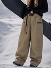 Pantalon de snowboard cargo ample et extensible pour femme, style freestyle, en tissu Techline utilitaire et résistant.