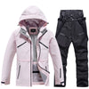 Ensemble veste et pantalon de ski isolés pour homme, idéal pour la montagne.