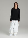 Salopette de ski Searipe Mountain pour femme, coupe ample, isolée.