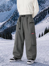 Pantalon de snowboard cargo ample et extensible pour homme, style freestyle, en tissu Techline utilitaire et résistant.