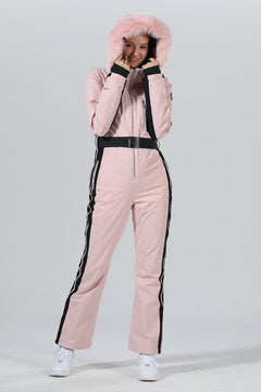 Combinaison de ski une pièce chic à capuche en fourrure pour femme, haute performance.