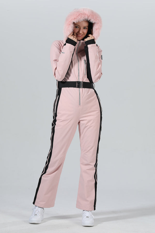 Combinaison de ski une pièce chic à capuche en fourrure pour femme, haute performance.