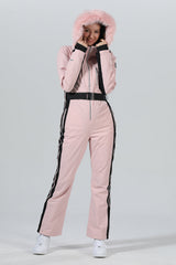 Combinaison de ski une pièce chic à capuche en fourrure pour femme, haute performance.