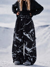 Pantalon de snowboard ample UrbanCraft pour femmes, conçu pour une mobilité accrue des genoux.
