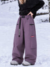 Pantalon de snowboard cargo ample et extensible pour femme, style freestyle, en tissu Techline utilitaire et résistant.