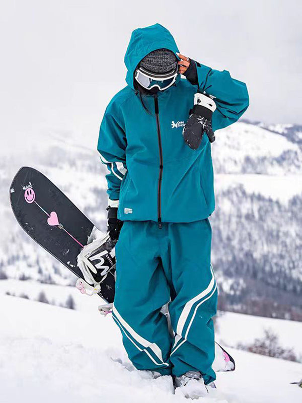 Combinaison de ski ample deux pièces John Snow Freestyle pour femme, à rayures latérales.
