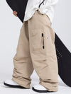 Pantalon de ski ample pour femme, style expédition en montagne, avec poches cargo latérales