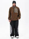 Pull en polaire sherpa synthétique pour homme et pantalon de ski cargo réfléchissant.