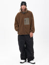 Pantalon de ski ample et décontracté pour homme, en polaire sherpa synthétique zippée et genoux renforcés.
