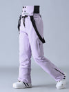 Salopette de ski SnowPeak StormGuard pour femme, isolée et résistante aux intempéries.