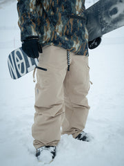 Men's loose fit ski pants, mountain expedition style, with side cargo pockets