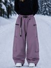 Pantalon de snowboard cargo ample et extensible pour femme, style freestyle, en tissu Techline utilitaire et résistant.