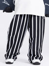 Pantalon cargo en denim Mountain Freerider pour homme, style ample, idéal pour le snowboard.