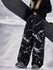 Pantalon de snowboard ample UrbanCraft pour femmes, conçu pour une mobilité accrue des genoux.