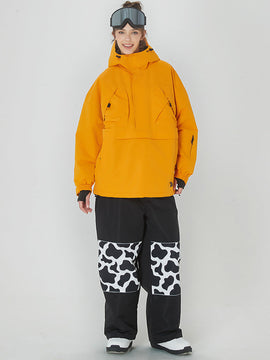 Combinaison de ski/snowboard thermique ample pour femme, style anorak, idéale pour le freeride.