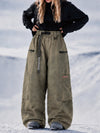 Pantalon de snowboard cargo ample et extensible pour femme, style freestyle, en tissu Techline utilitaire et résistant.