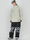Combinaison de ski/snowboard thermique ample pour femme, style anorak, idéale pour le freeride.