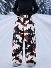 Pantalon de snowboard ample Park Rider Nightline pour femme, poches cargo et détails réfléchissants