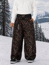 Pantalon de snowboard ample OG pour homme, style urbain, inspiré des vêtements de travail, avec rivets apparents et coupe large.