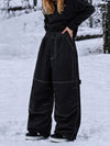 Pantalon de snowboard ample UrbanCraft pour femmes, conçu pour une mobilité accrue des genoux.