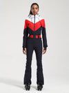 Combinaison de ski une pièce Gsou Snow rétro pour femme, à ceinture et coupe évasée colorée.