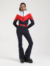 Combinaison de ski une pièce Gsou Snow rétro pour femme, à ceinture et coupe évasée colorée.