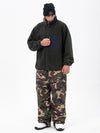 Pantalon de ski ample et zippé en polaire sherpa synthétique pour homme, avec genoux renforcés.